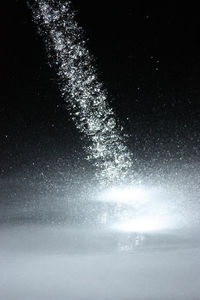 Scenic view of tree against sky at night