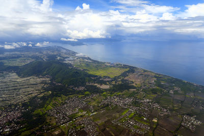 Aerial view of cityscape against sky