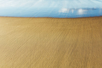 Full frame shot of sand on beach