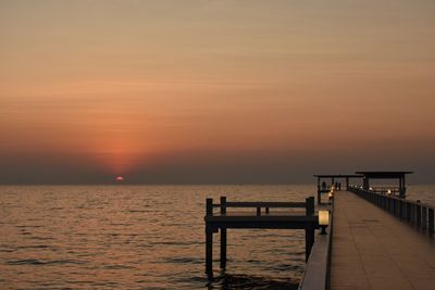 Jetty on pier at sunset