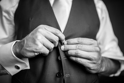 Close-up of couple holding hands