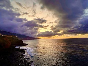 Scenic view of sea against sky during sunset