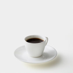 High angle view of coffee cup on table