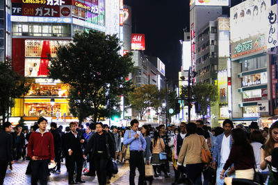 Crowd in city at night