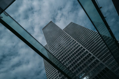 Low angle view of skyscrapers against sky