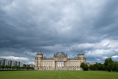 View of historical building against cloudy sky