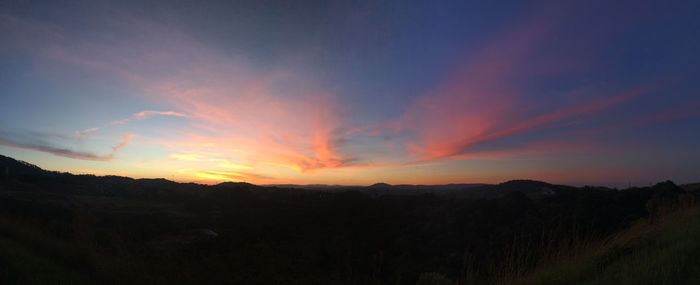 Scenic view of landscape at sunset
