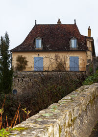 Low angle view of old building against sky