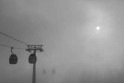 Low angle view of street light against sky