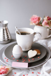 Close-up of coffee cup on table