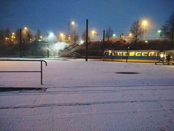 Snow covered city at night