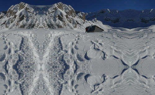 Snow covered mountain against sky