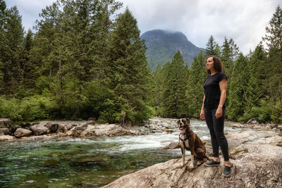 Full length of man with dog