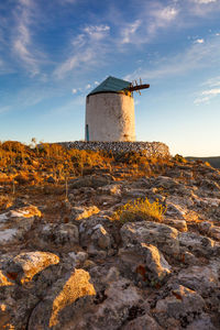 Old windmill near chora village on kimolos island in greece.