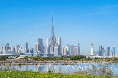 Modern buildings in city at waterfront