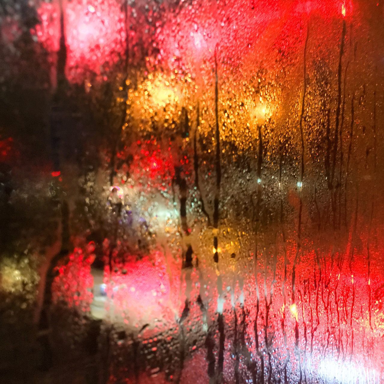 RAINDROPS ON GLASS WINDOW