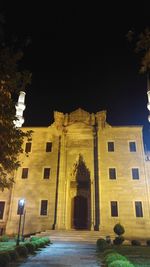 Low angle view of historical building against sky at night