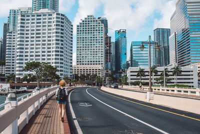 Modern buildings in city against sky