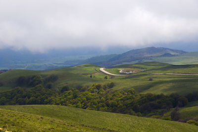 Mountain landscape in georgia. landscape from didgori road. clouds and blue sky.