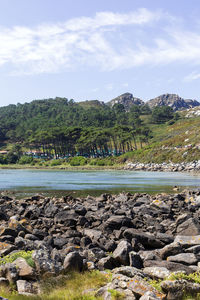 Scenic view of rocks against sky