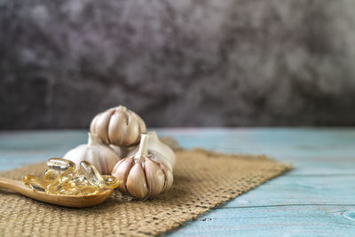 Close-up of garlic on table