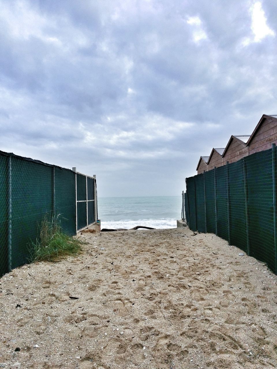 sky, sea, beach, architecture, built structure, horizon over water, building exterior, cloud - sky, water, shore, sand, cloudy, cloud, house, day, tranquility, nature, scenics, outdoors, tranquil scene