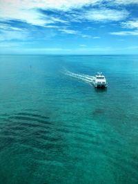 Scenic view of seascape against cloudy sky