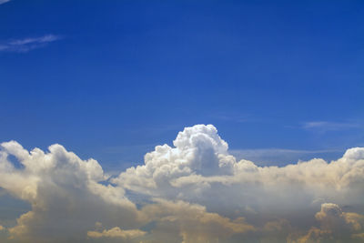 Low angle view of cloudscape against blue sky