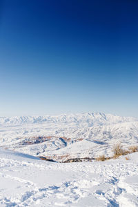 Beautiful landscape of different mountains of beldersay in sunny clear weather with blue sky