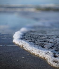 Close-up of waves on beach