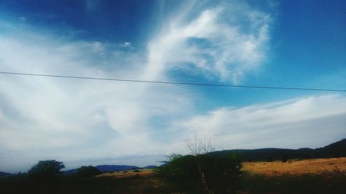 Low angle view of vapor trails in sky