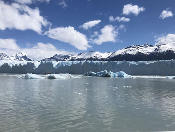 Scenic view of frozen lake against sky