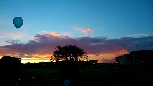 Scenic view of silhouette trees against sky during sunset