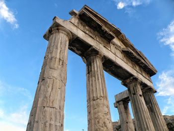 Low angle view of historical building against blue sky