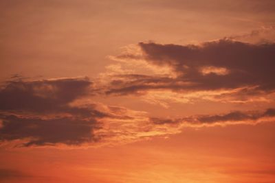 Low angle view of clouds in sky during sunset