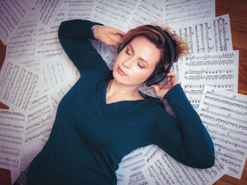 High angle portrait of woman on paper