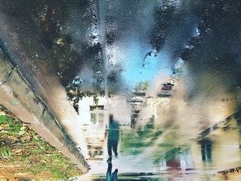 Wet street in city during rainy season