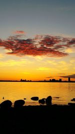 Scenic view of sea at sunset