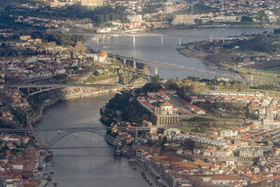 High angle view of river amidst buildings in city