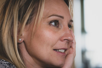 Close-up portrait of woman looking away