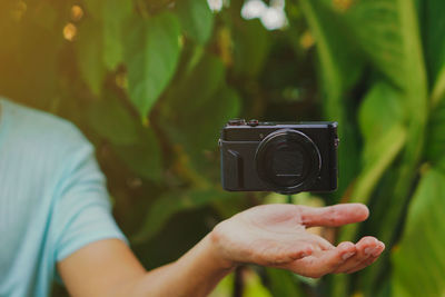 Man photographing camera