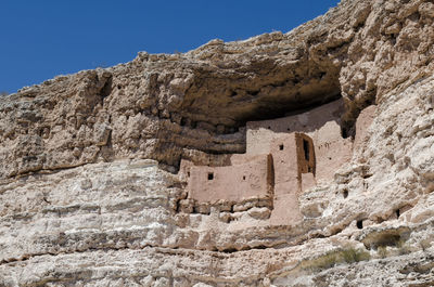 Low angle view of old ruins against clear sky