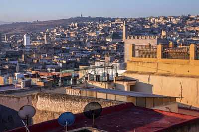 Aerial view of cityscape or old town with mountain in background