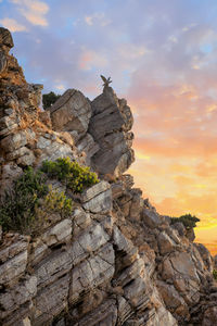 Low angle view of rocky mountains against sky during sunset. crimea