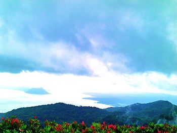 Scenic view of clouds over mountain