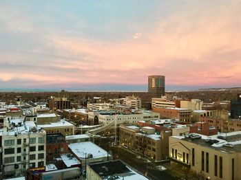 High angle view of cityscape against sky during sunset
