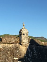 Cross against clear sky