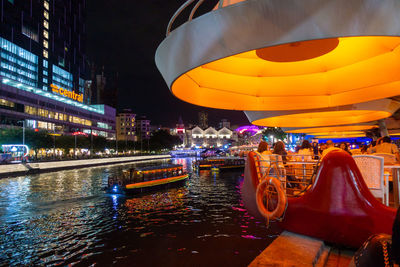 Aerial view of illuminated city at night