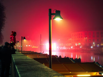 Illuminated street light at night