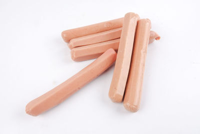 High angle view of bread on white background